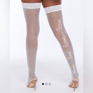 LOVE LANGUAGE FISHNET THIGH
HIGHS